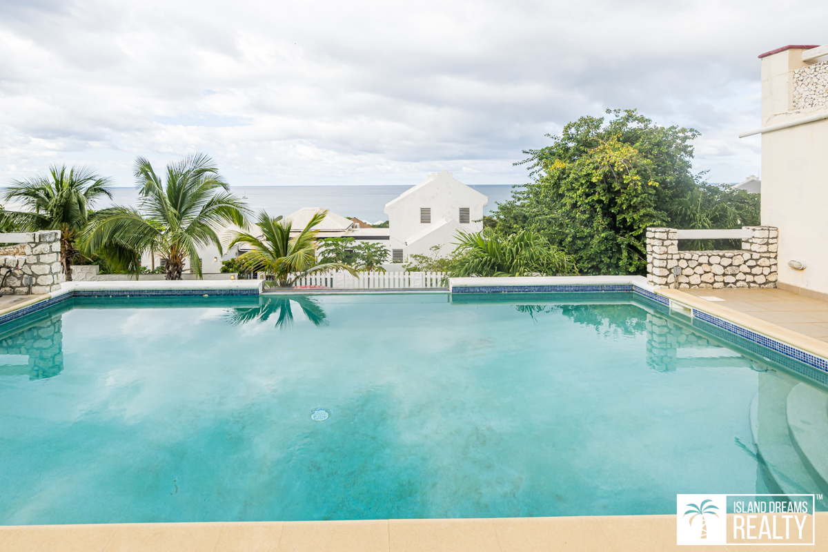 Swimming Pool water blue skies vacation home love island life awesome how to relax st maarten sxm st martin real estate realty best way chill house villa condo furniture beach sea surf shop waves agent agency beautiful weather natural mansion green saint martin sint maarten sint marten saint marten sint martin saint marten nature for sale for rent holiday dream Caribbean tropical lifestyle new home sweet garage palm tree fish like work from here