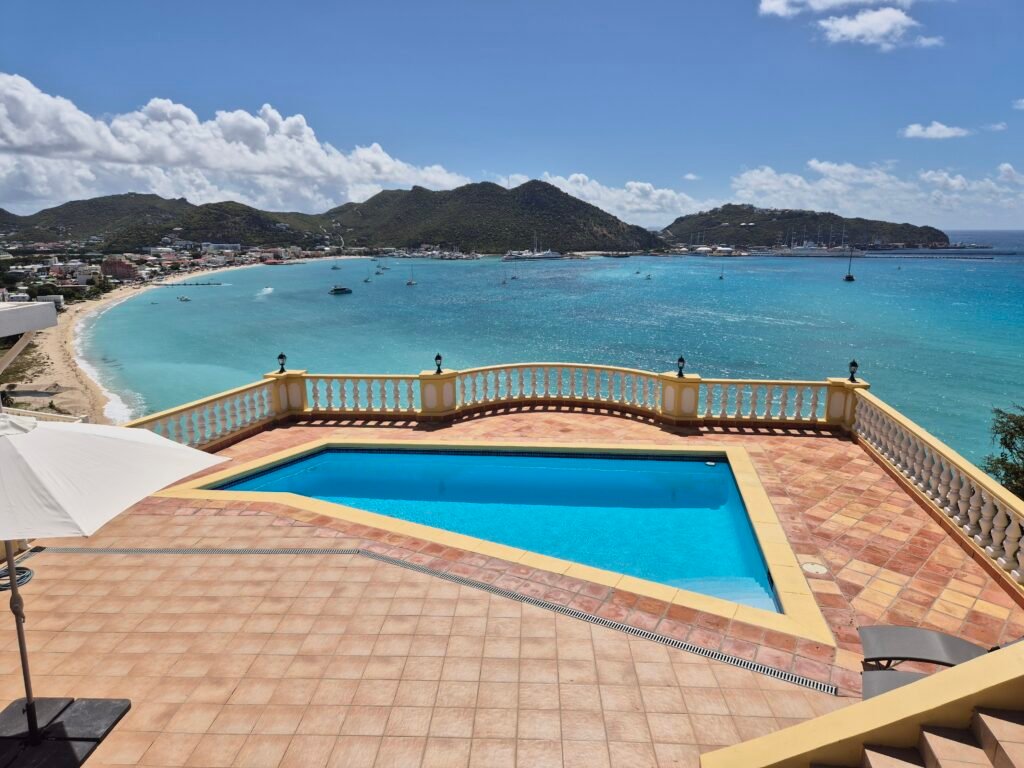 Swimming Pool water blue skies vacation home love island life awesome how to relax st maarten sxm st martin real estate realty best way chill house villa condo furniture beach sea surf shop waves agent agency beautiful weather natural mansion green saint martin sint maarten sint marten saint marten sint martin saint marten nature for sale for rent holiday dream Caribbean tropical lifestyle new home sweet garage palm tree fish like work from here