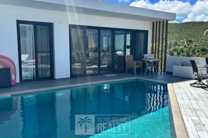 Swimming Pool water blue skies vacation home love island life awesome how to relax st maarten sxm st martin real estate realty best way chill house villa condo furniture beach sea surf shop waves agent agency beautiful weather natural mansion green saint martin sint maarten sint maarten saint martin sint martin saint martin nature for sale for rent holiday dream Caribbean tropical lifestyle new home sweet garage palm tree fish like work from here