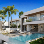 Modern white villa with a rectangular pool, lounge chairs, and palm trees under a clear blue sky