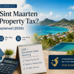 Cover for Sint Maarten Real Estate Guide asking 'Does Sint Maarten Have Property Tax?' with island coast view and pool.